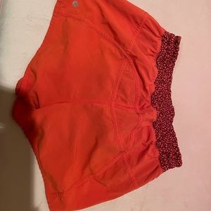 RELISTED - red/orange lululemon shorts SIZE 6